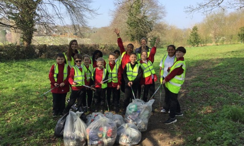 Group photo of the Eco Committee after completing their litter pick in the local area.